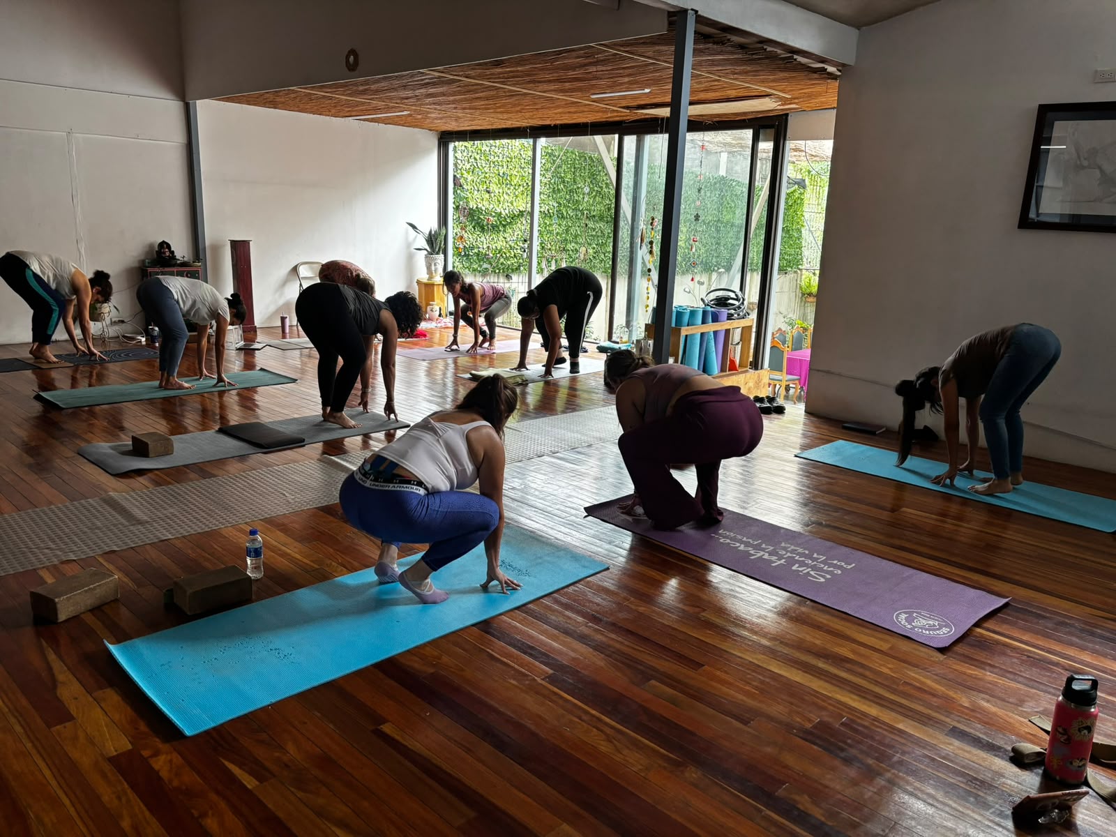 Yoga class in practice at Nossa studio